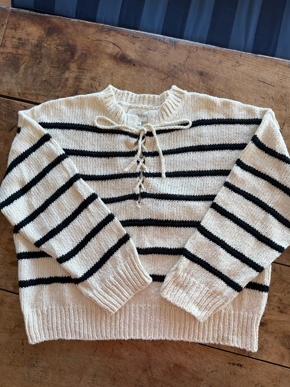 The Great’s Cream and Navy Striped Lace-Up Sweater